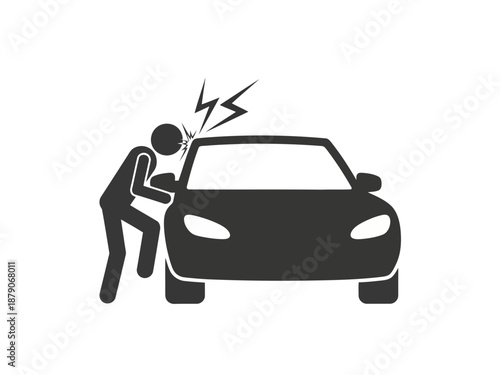 Man hitting car with fist in frustration or anger