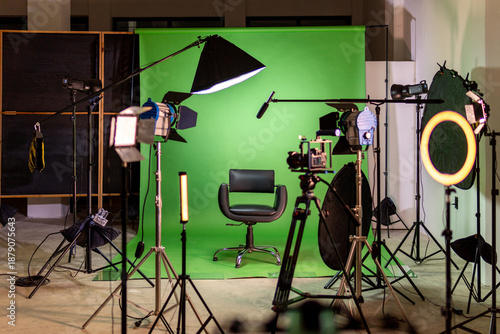 Studio set with green screen and filming equipment