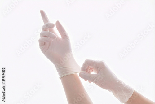 Experiment science people point show up concept. Close up photo of professional experienced doctor putting on white sterile rubber gloves isolated on white background copyspace empty blank place