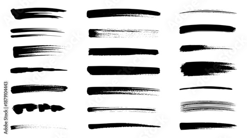 Collection of various hand-drawn black brush stroke elements and lines on a white background, perfect for graphic design.