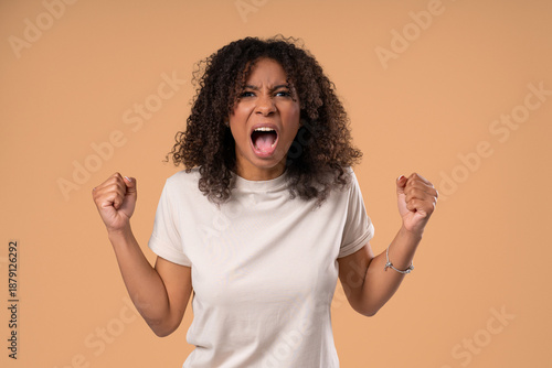 Angry African Woman Yelling At Camera With Expressive Face In Frustration,Stress