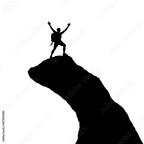 Silhouette of Rock Climber Reaching Summit