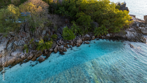 High-end drone photos of Seychelles beaches from above, featuring white sand, crystal clear turquoise water, and tropical coastlines, perfect for travel, vacation, and luxury lifestyle concepts