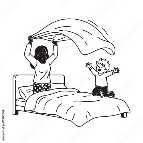Two children playing on a bed with a blanket lifted in the air during a playful morning scene.