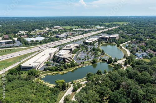 Aerial view of suburban office park with ponds
