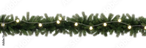 Festive Christmas garland with warm string lights on green pine branches