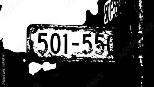 Closeup of a weathered street sign plate with abstract high-contrast graffiti and urban decay.