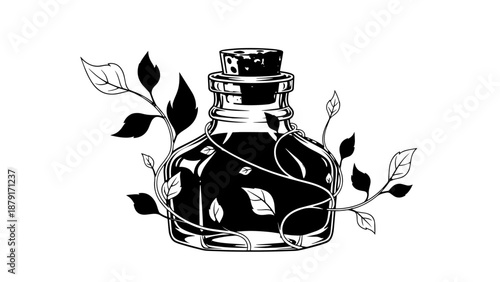 Vintage ink bottle with botanical leaf illustrations in black and white.