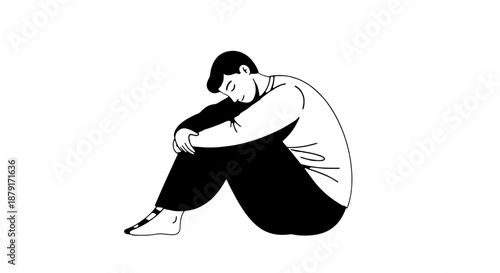 Solitary figure sitting with knees drawn up, conveying introspection and melancholy mood.