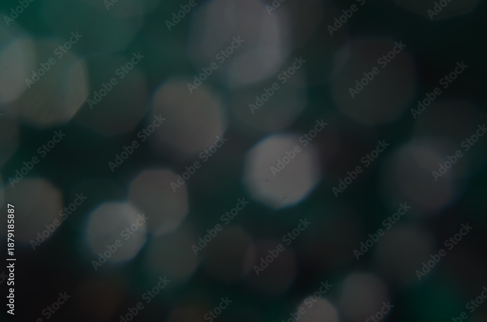 Naklejka premium Blurry bokeh lights background with soft white and green tones