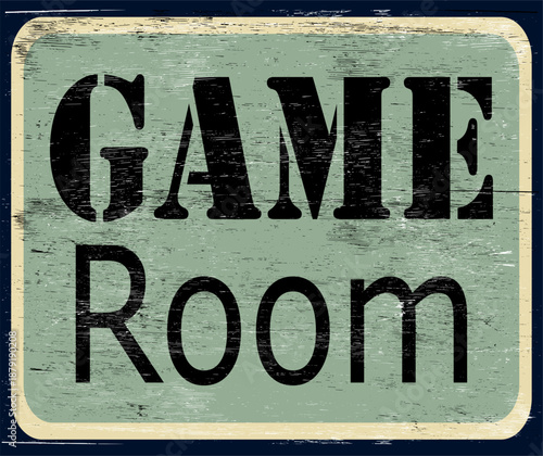 Aged and worn game room sign on wood