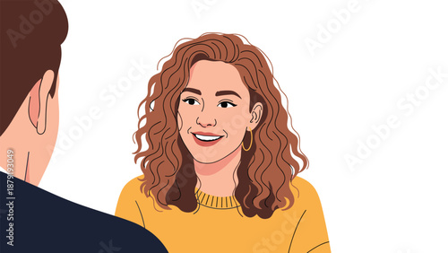 A vibrant woman with beautiful curly brown hair, wearing a cheerful yellow sweater, smiling warmly and engaging in conversation with someone off-screen, conveying friendliness and connection.