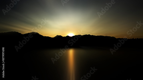 Morning view of the beautiful sunrise over the lake with hill silhouette. Sunset silhouettes with and golden light reflection on calm water. Tranquil nature landscape background. 