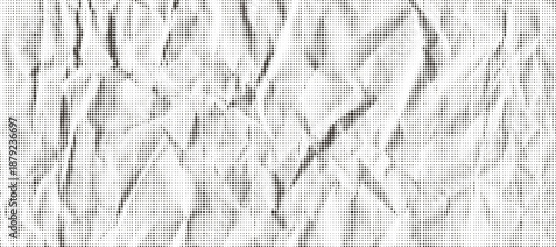 Abstract beige brown crumpled paper halftone textured background. Modern dotted print of old dark and light wrinkled sheet texture for retro business design, banner, vintage shadow surface
