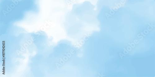 A beautiful clear blue sky background filled with bright white fluffy cumulus clouds on a light summer day creates a scenic nature cloudscape and atmosphere