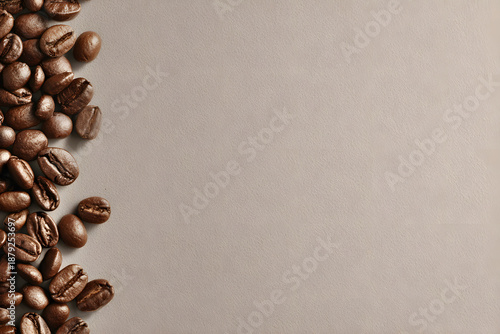 Freshly roasted coffee beans spread across a smooth surface during the morning hours in a cozy kitchen