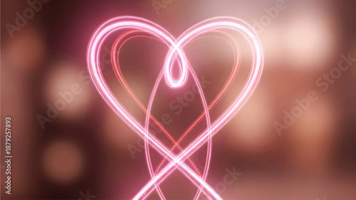 Glowing pink heart light installation on blurred background