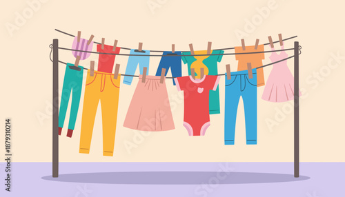 Colorful clothes hanging on a clothesline with pegs indoors  