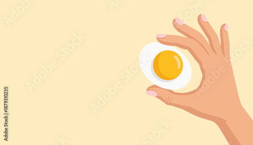 Hand holding peeled hard-boiled egg