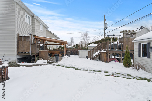 Beautiful winter landscape covered with fresh white snow, featuring pine trees and a clear blue sky. This image is perfect for travel, holiday, Christmas, New Year, nature background, seasonal design,