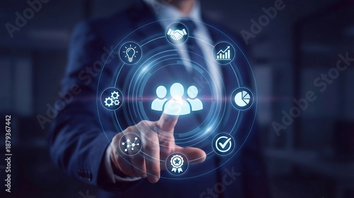 Wallpaper Mural Businessman engaging with futuristic digital interface for team management and collaboration, symbolizing innovation and productivity in modern business settings. Torontodigital.ca