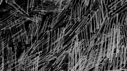 Abstract chaotic white chalk scribble texture animation on black background for creative motion graphics overlay.Stop motion animation 4k