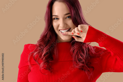Beautiful young woman with ...