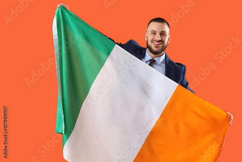 Young businessman with flag...
