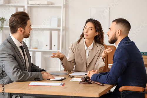 Female Asian court mediator...