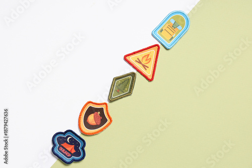 Set of scout badges on whit...