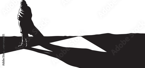 Silhouette of a person standing alone in desert landscape