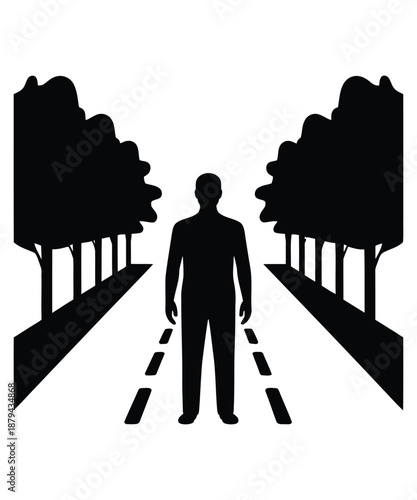A man standing at a fork in the road with two paths ahead