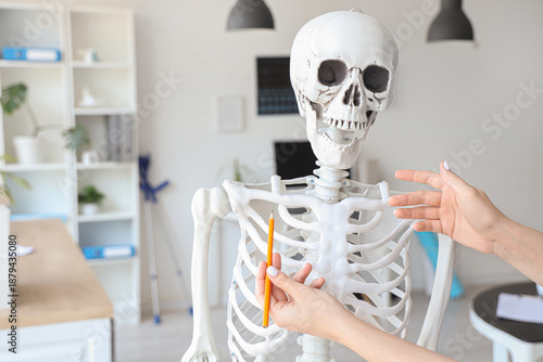 Female doctor with pencil e...