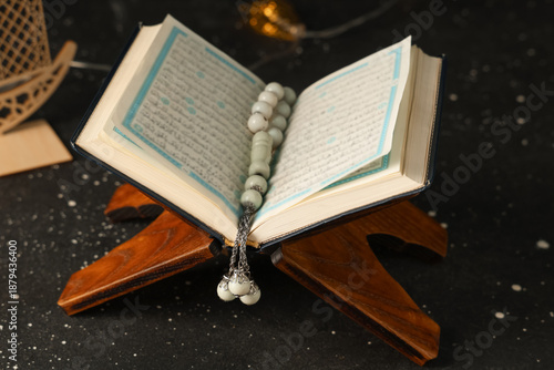 Wooden stand with Koran and...