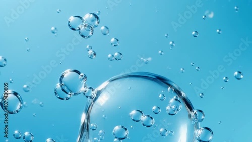 Wallpaper Mural Macro shot of effervescent, clear oxygen bubbles floating and rising in bright blue, clean water or cosmetic liquid background. Torontodigital.ca