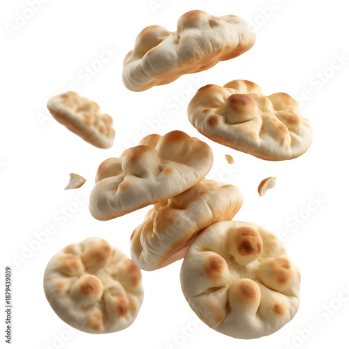 Flying focaccia bread pieces in mid air floating transparent background