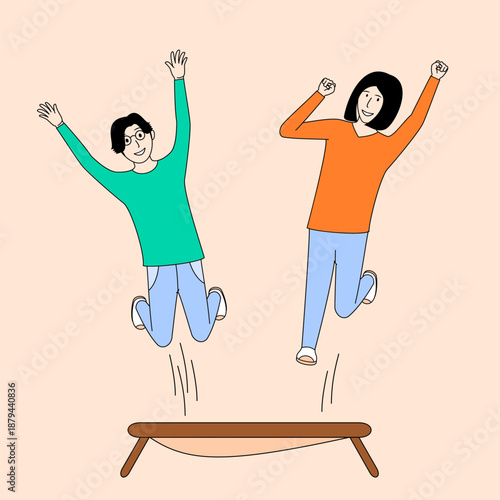 Two people are jumping on a trampoline