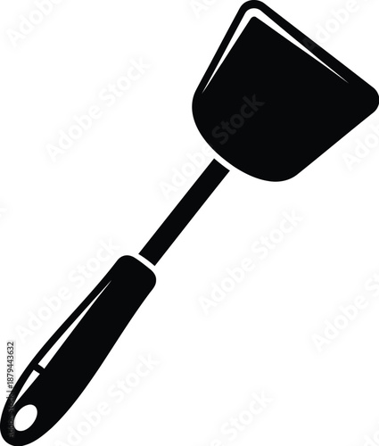 Black cooking spatula for food preparation, kitchen utensil on display