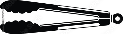 Black serving tongs, kitchen utensil for cooking and grilling concept