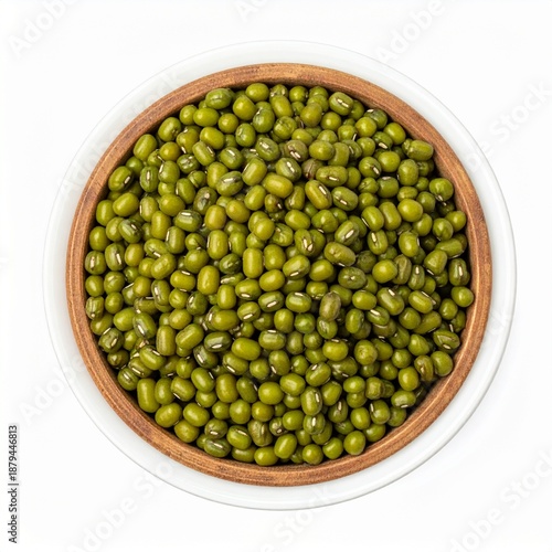 Overhead view of a wooden bowl filled with vibrant green mung beans, a healthy food source.