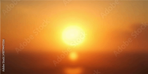 Sunset over the ocean with bright sun and warm sky