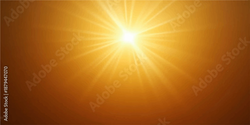 Sun shining through bright rays in a warm sky