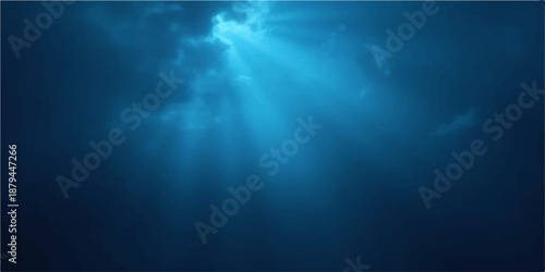 A bright burst of sunlight creates a shimmering ray of light through the deep blue ocean water, forming a seamless underwater world loop with a motion flare pattern backdrop