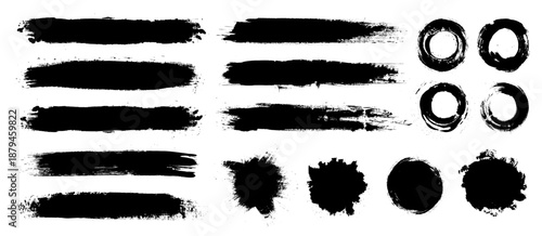 Abstract brush strokes and circular shapes creating a textured design. Black ink brush stroke and circle texture set. Freehand grunge brush illustration.