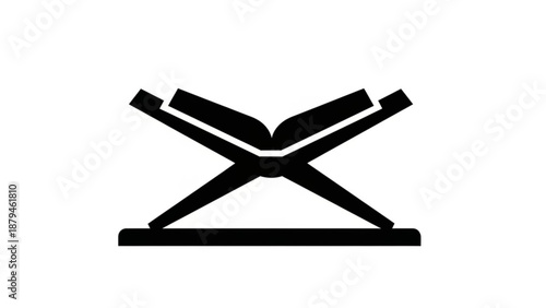 Black Book Lying Open on Stand, Isolated on White