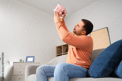 Bankrupt young man with emp...