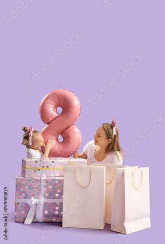 Little girl with her mother, gifts and balloon in shape of figure 8 on lilac background. International Women's Day