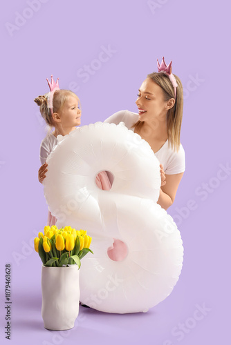 Little girl with her mother, tulips and balloon in shape of figure 8 on lilac background. International Women's Day