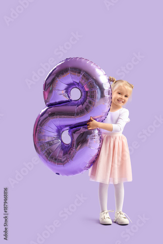 Little smiling girl with  balloon in shape of figure 8 on lilac background. International Women's Day