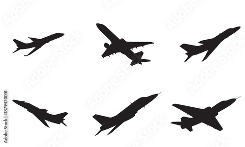 Set of black jet fighter and airplane silhouettes in flight